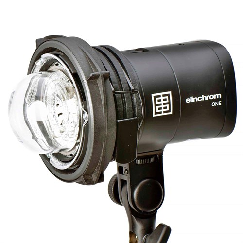 Clamps securely in selected position on the flash